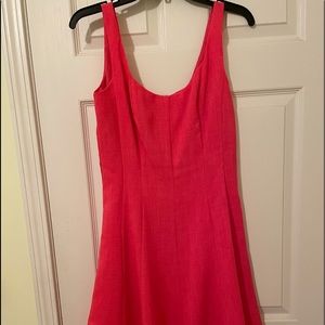 Sundress….bright coral color..  Comes with straw belt .
